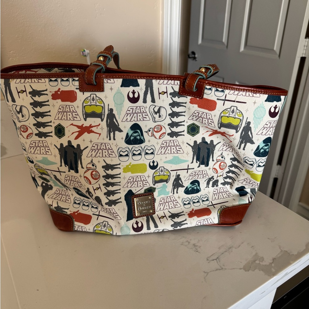 Star Wars Enthusiast Dooney and Burke Bag  over the shoulder bad